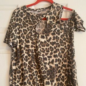Woman’s cheetah print cold shoulder top